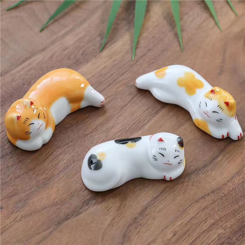 Handcrafted Ceramic Chopsticks Rest with designs of cats, pandas, and Christmas Santa Claus (9PC)